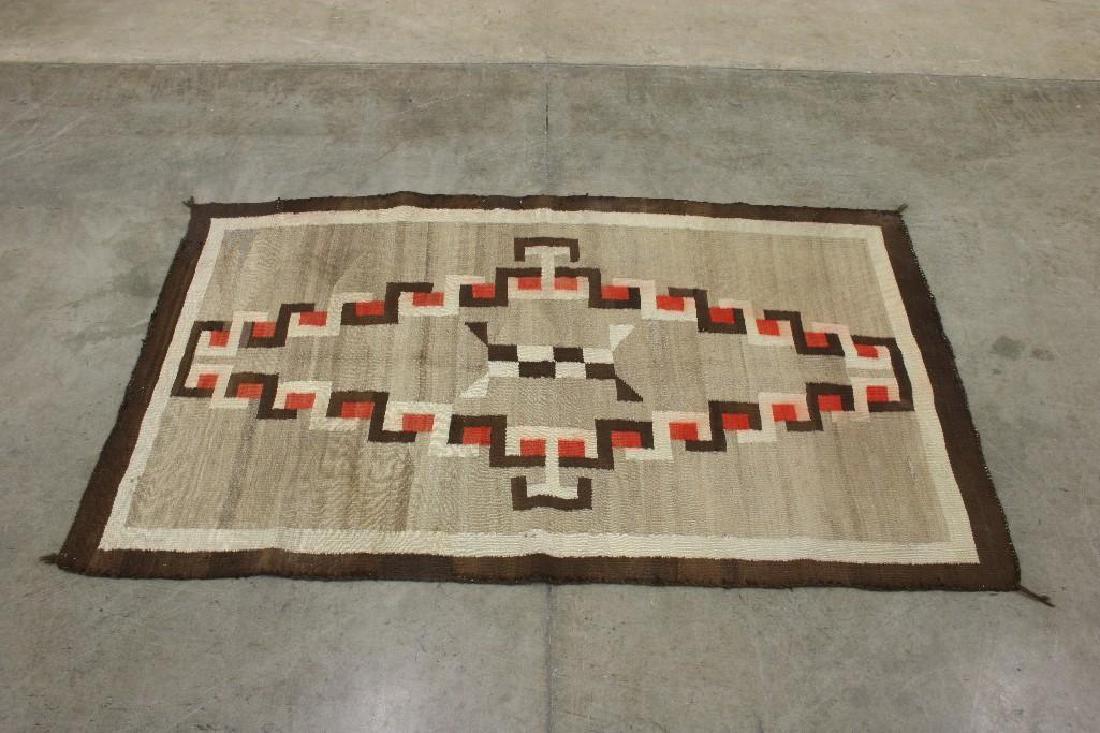 Vintage Navajo Rug Ganado Klagetoh Circa 1920: Approx. 69 in x 39 in. Red, black, white geometric pattern on gray background.
