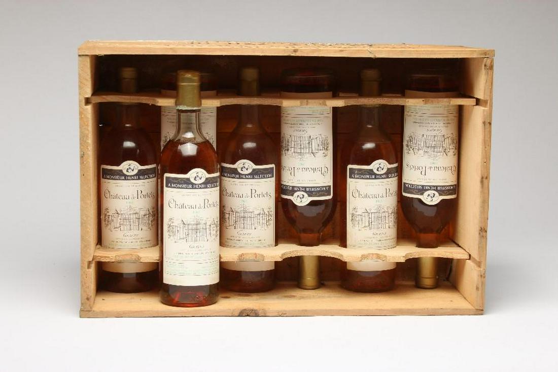 Seven (7) 710ml Bottles 1969 Chateau de Portets Vintage: Vintage French Wine. Gran Vin de Graves. Appellation Graves Controlee. Product of France. Includes box.