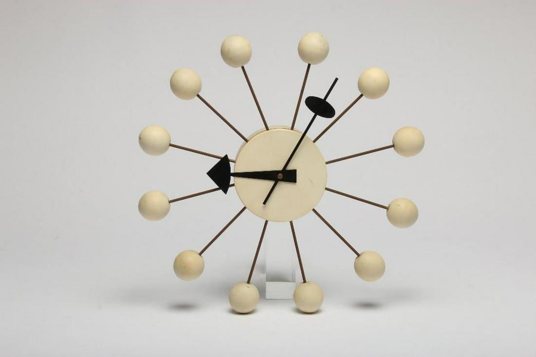 Vintage Howard-Miller Ball Wall Clock by George Nelson: Black and white. Approx. 13.5 in Dia.