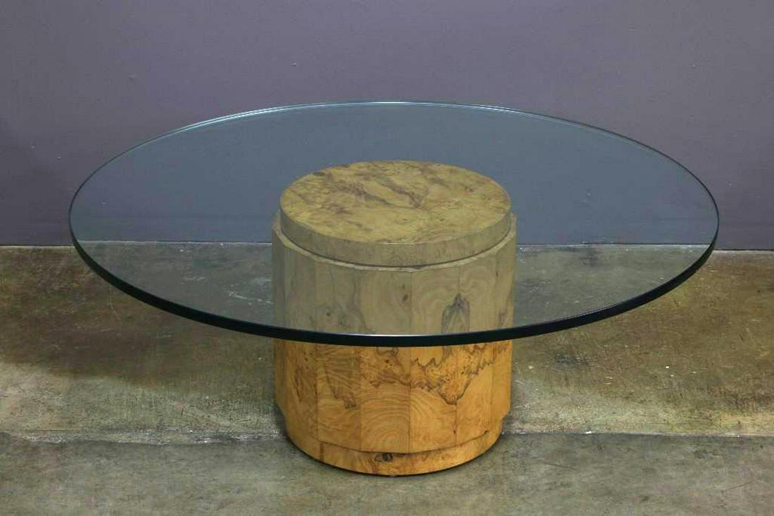 Mid Century Dunbar by Edward Wormley Coffee Table: Burled olive wood base with glass top coffee table. Approx. 42 in Dia x 17 in H. Glass .75 inch thick.