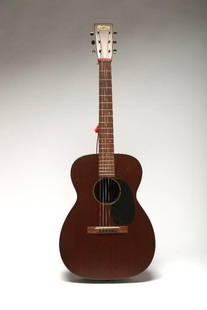 Martin 00-17 Acoustic Guitar Circa 1995-96: Serial num 58253. With chipboard case. Includes original purchase price tag.