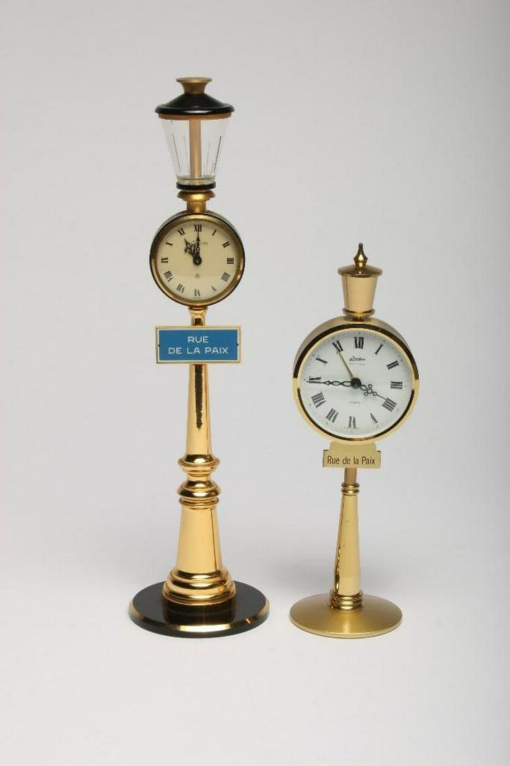 Two Vintage Rue de la Paix Table Clocks: 1) Le Coultre approx. 11.25 in H; 2) Linden Heritage approx. 8 in H.