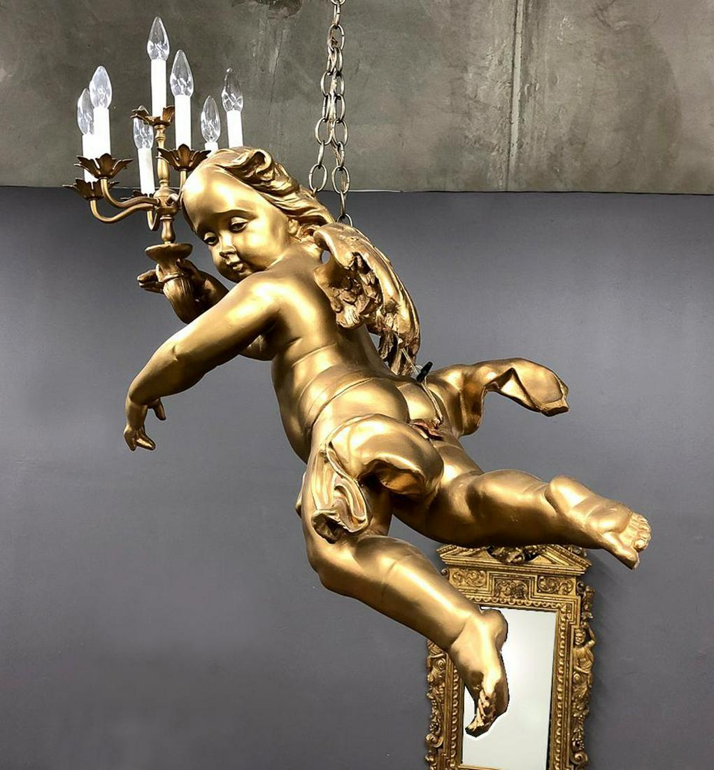 Hanging Cherub Pendant Light From The Madonna Inn: Approx. 36 in H x 48 in W.