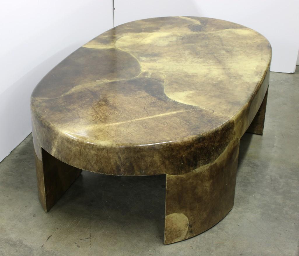 Sally Sirkin Lewis / J Robert Scott Oval Coffee Table: Oval Goat's Skin Coffee Table. Approx. 60 in W x 36 inŒæ D x 18 in H.