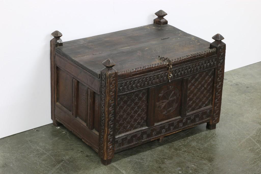 Antique Carved Wood Chest Moroccan: Carved wood chest with metal hardware. Approx. 21 in H x 28 in W x 21.25 in D.