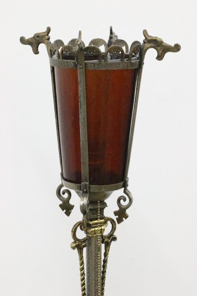 Attrib. Oscar Bach Floor Lamp w/ Original Amber Glass: Approx. 59.25 in T x 14 W x 14 D. Likely the work of Oscar Bach. Primarily cast bronze with steel and features original amber glass shade.