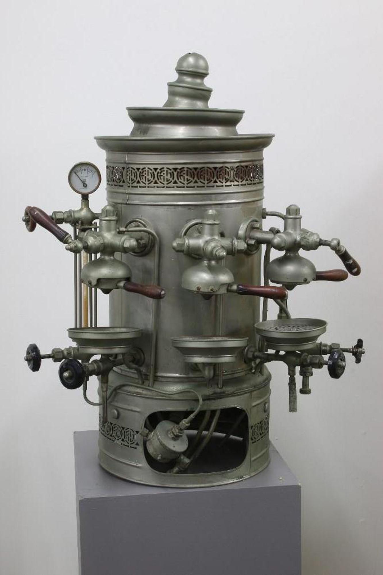 Antique Commercial Espresso Machine Aicardo Urbe: Approx dimensions: 35.5 in H x 23 in W. As is condition. Not tested. Provenance: From the Estate of Film Producer and Graphic Artist David Weisman (1942-2019).