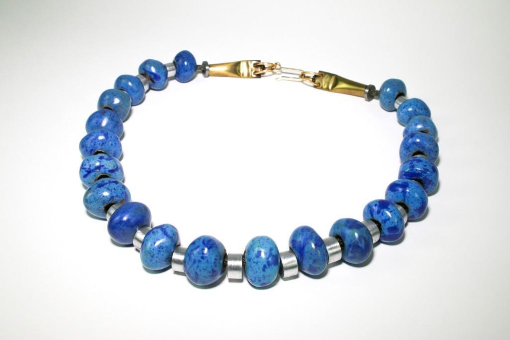 Doyle Lane (1925-2002) Ceramic Blue Bead Necklace: Original Doyle Lane (1925-2002) Ceramic Blue Bead Pottery Necklace. 21 beads. Approx. 24 inches long. Weight: 213.1 grams.