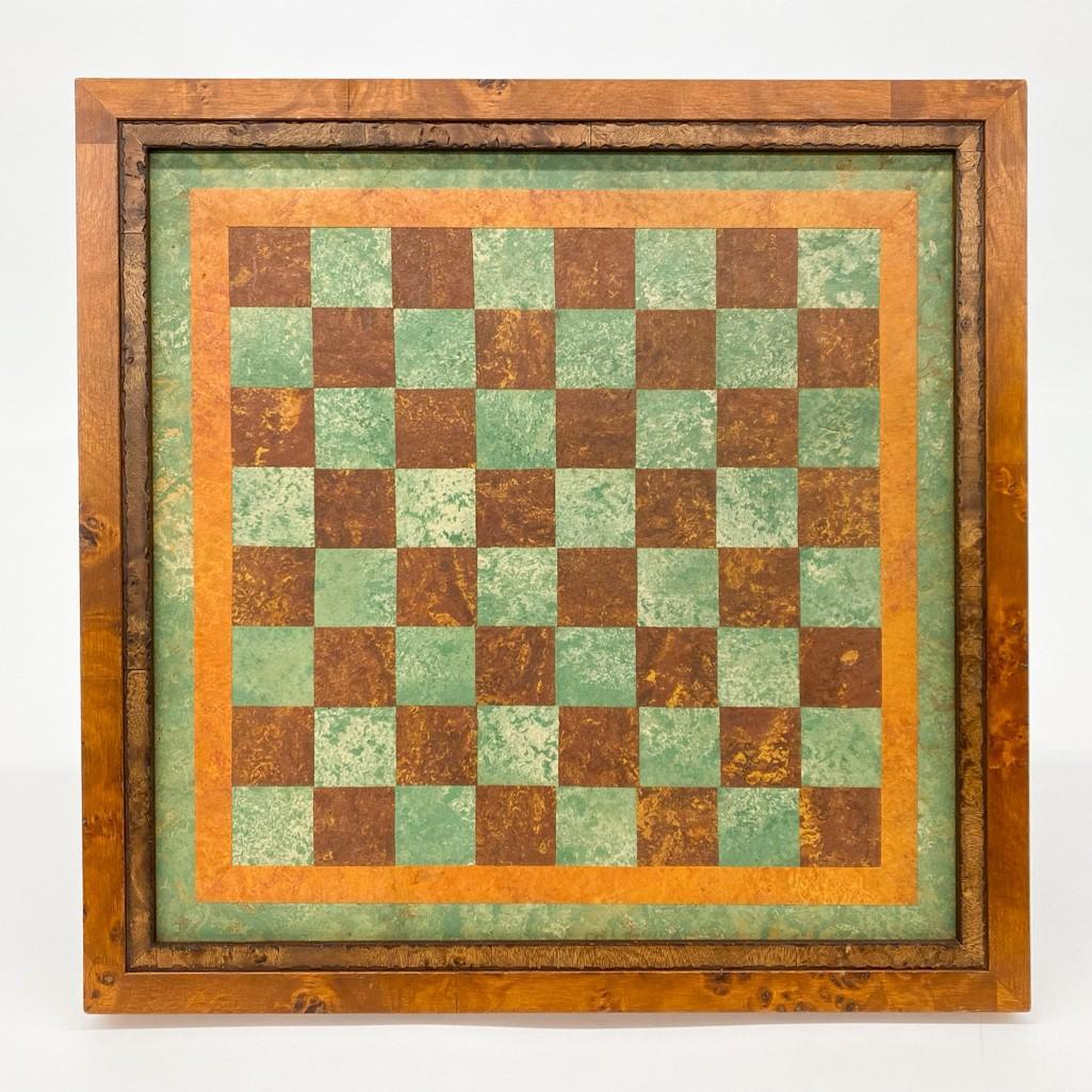 Artisan Made Chess & Checker Board: Artisan Made Chess & Checker Board. Maker Unknown. This board has unique coloring of mottled burnt orange and green patina. Framed with a slight lip to prevent pieces from scooting off. Overall: 17.5 