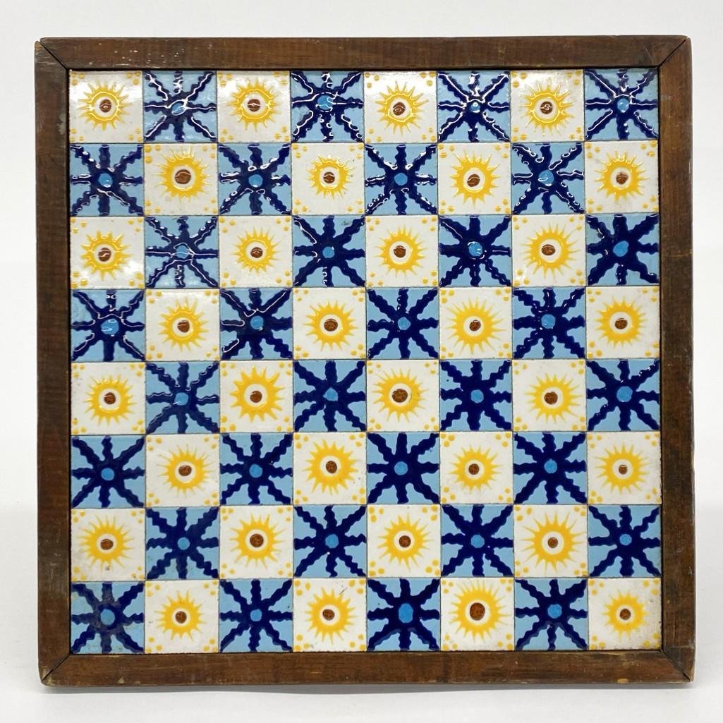Artisan Made Ceramic Tile Chess & Checker Board: Artisan Made Ceramic Tile Chess & Checker Board. Maker Unknown. Starbursts and sunbursts design make very interesting linear optical effects. Overall: 15.5 in. x 15.5 in. x 1 in. Weight 6 lbs. 14 oz.
