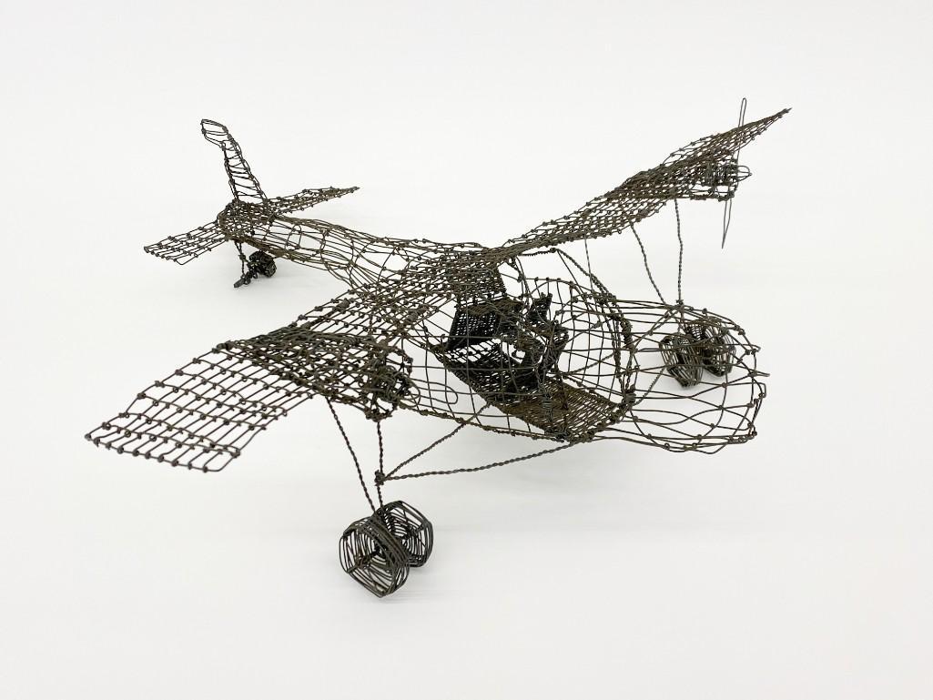 Wire Sculpture Model of an Airplane: Wire Sculpture of an Airplane. Approx. 23 in. x 27 in. x 8 in. Weight 1 lb. 8 oz.