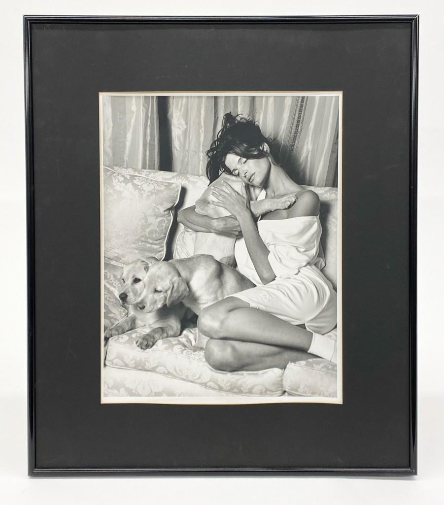 Lot of (2) Bruce Weber Photographs Stephanie Seymour: Two (2) Bruce Weber Photographic Prints on Photo Paper. Stephanie Seymour, 1994. Photos taken March 1994 for Victoria's Secret. Three Labrador puppies. Visible: Approx. 13.5 in. x 10.5 in. Frame: Appr