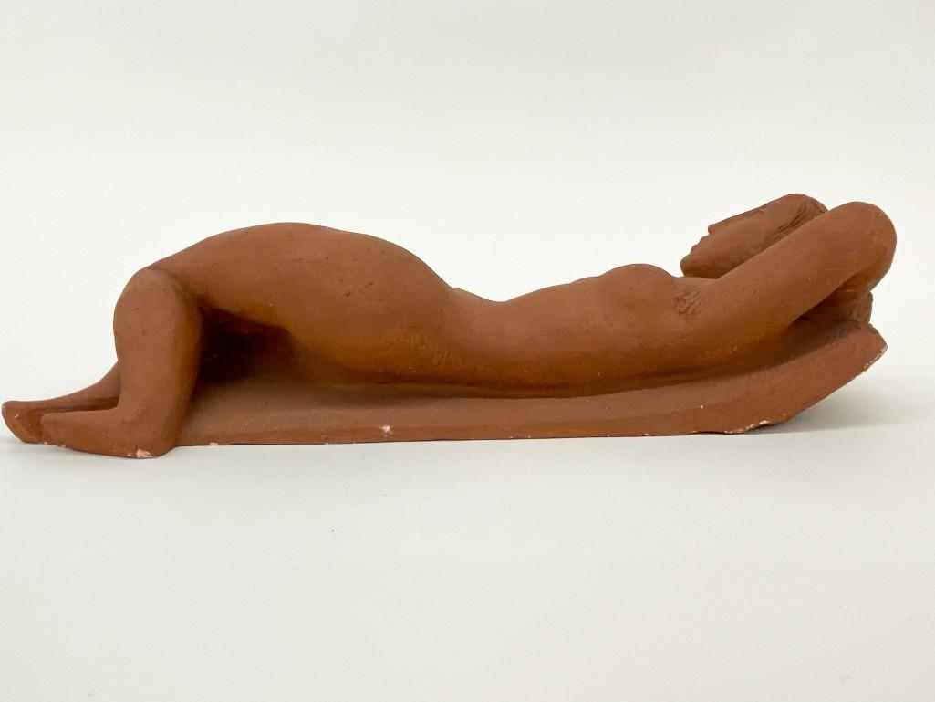 Artist Unknown Terra Cotta Figure Reclining Nude: Artist Unknown, Unglazed Terra Cotta Figure, Reclining Nude. Approx. 16.5 in. x 7 in. x 4 in. Weight 8 lbs. 13 oz.
