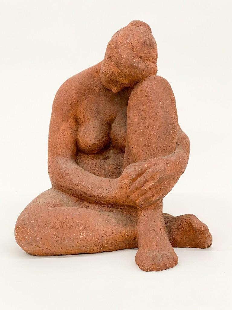 Unglazed Terra Cotta Nude Female Figure: Unglazed Terra Cotta Figure. Nude female in melancholic pose. Approx. 13 in. x 13 in. x 11 in. Weight 22 lbs. 5 oz.
