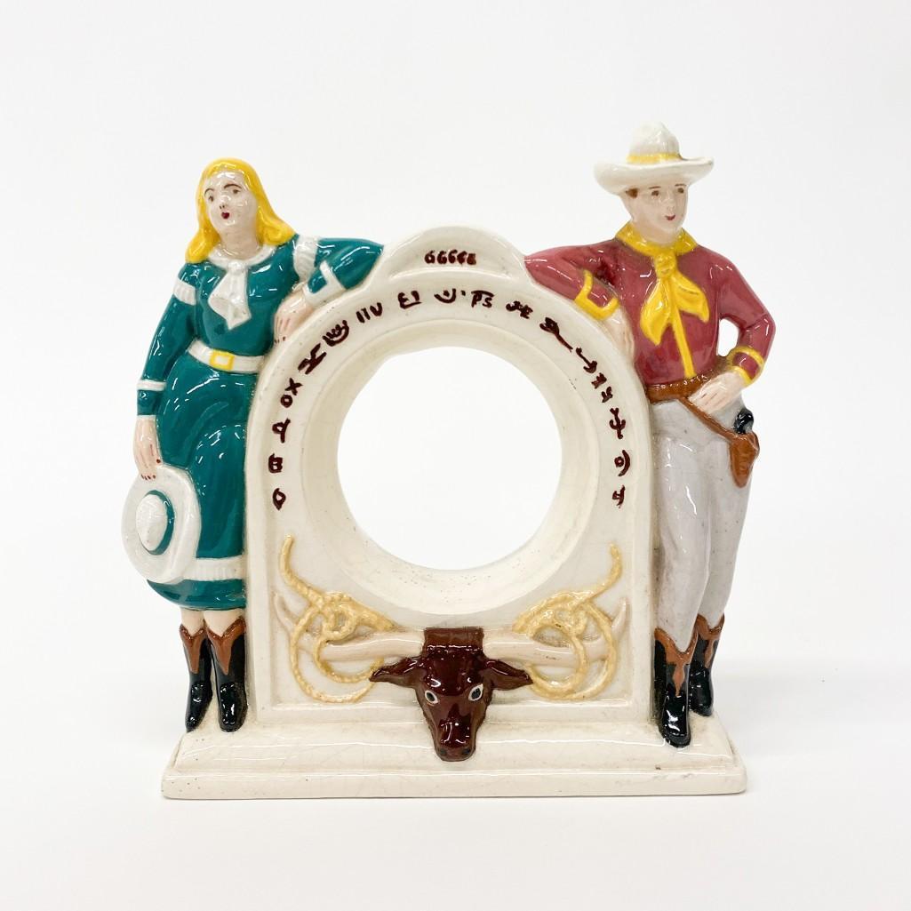 Vintage Porcelain Clock Body E.S.L. Hess 1956 Cowboy: Vintage Porcelain Slip Mold Clock Body, American West Cowboy Cowgirl Themed. Signed E. S. L. Hess, 1956. Approx. 8 in. x 9 in. x 2.75 in. Clock opening 3.5 in. Weight 1 lb. 5 oz.
