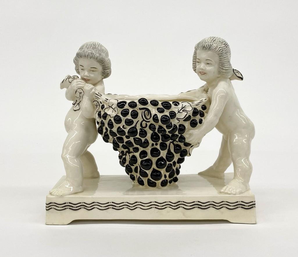 Michael Powolny (1871-1954) Vienna Porcelain Sculpture: This piece is missing lid. Approx. 12.25 in H x 13 in wide x 7.5 in deep. Weight 7 lbs 6 oz.