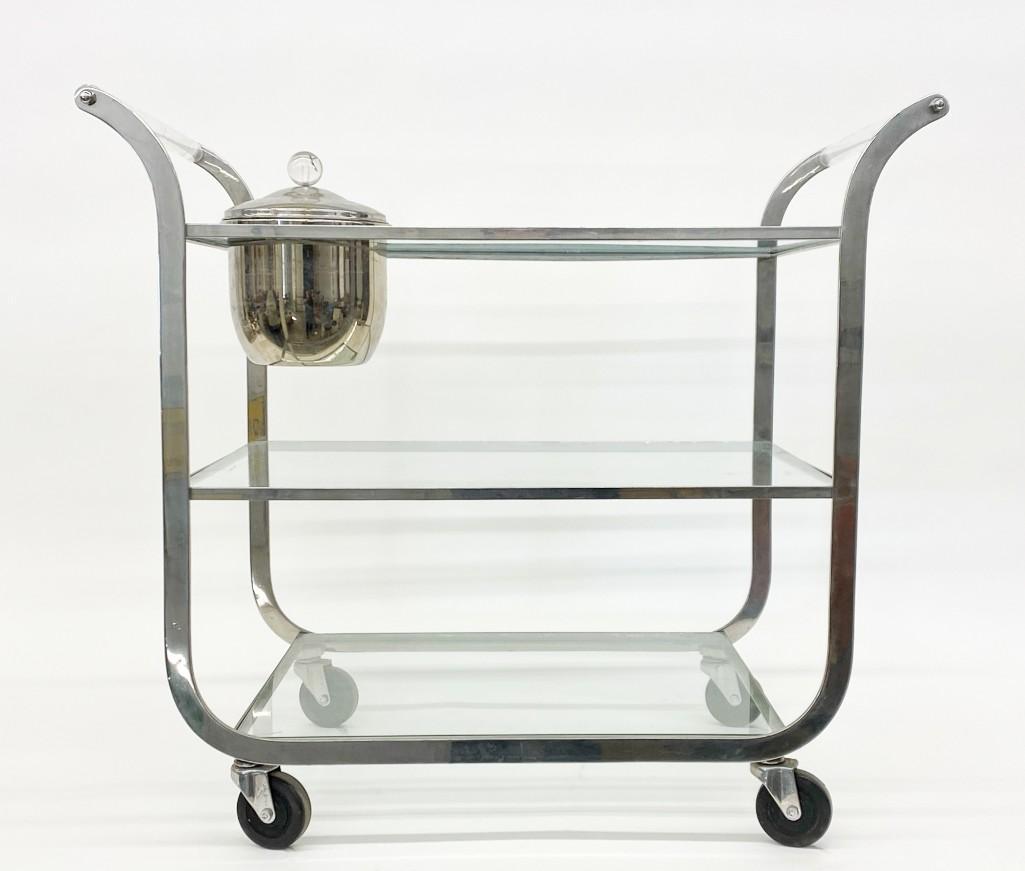 Vintage Bar Cart w/ Mercury Glass and Lucite Ice Bucket: Vintage Aluminum/Glass Bar Cart with Mercury Glass, Metal, and Lucite Ice Bucket. Approx. 32 in. x 29 in. x 18 in. Weight 60 lbs.