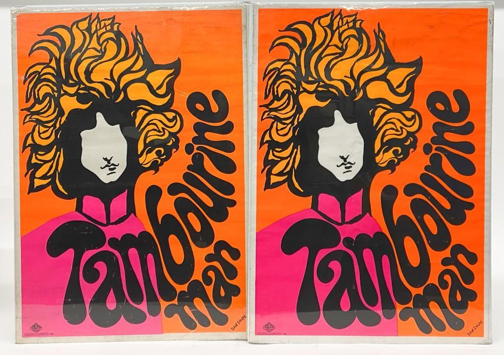 Lot (2) 1967 Dan Shupe Bob Dylan Tambourine Man: Lot of Two (2) Original 1967 Dan Shupe Tambourine Man Posters. Caricature of Bob Dylan in Psychedelic colors. Shrink Wrapped on Foam Core. Overall: Approx. 35.5 in. x 23.5 in. Weight 2 lbs.