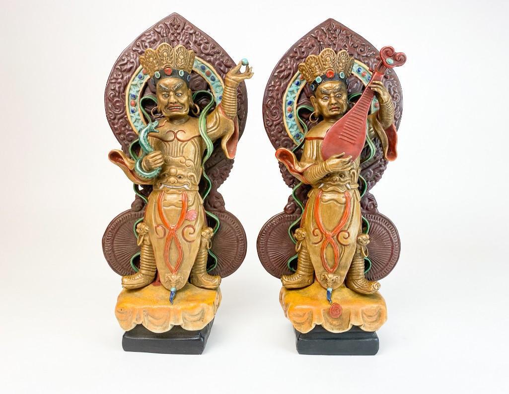 Pair Chinese Porcelain Temple Deity Figures: Stamped on bottom. Approx. dimensions 15.5 in. H x 7 in. W x 4 in. D. Weight 10 lbs. 6 oz.
