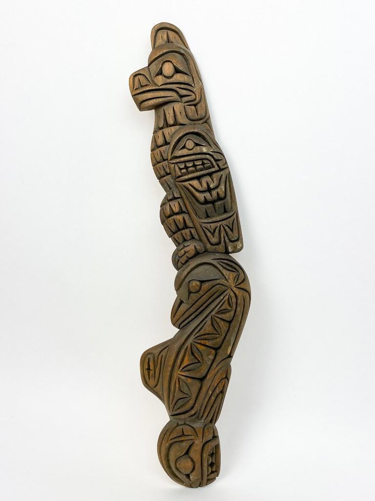 Frank White Eagle (1982) Carved Wood Totem: Overall very good condition. Approx. dimensions 19 in. L x 5 in. W. Weight 5 oz.