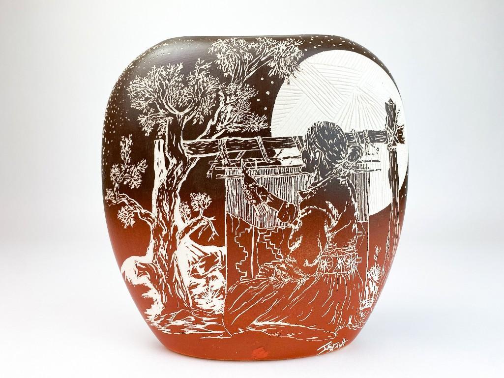 Hozoni Pottery Painted Incised Vessel, Signed: Hozoni Pottery Painted Incised Vessel Depicting Weaver, Artist Signed. Overall excellent condition. Approx. dimensions 8.5 in. H x 8.5 in. W x 4 in. D. Weight 2 lbs. 1 oz.