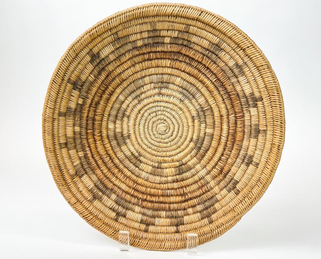 Paiute Wedding Tray American Indian: American Indian Paiute, second quarter 20th Century. Wedding tray in a three rod foundation and sumac splints with an open ring of black stepped mountains and red interior band. Approx. 2.5 in H x 12.
