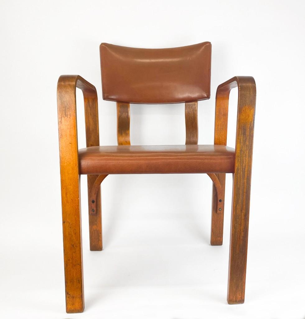 Thonet Mid-Century Bentwood Armchair: Thonet Mid-Century Bentwood Armchair w/ Vinyl Seat & Back. Good condition overall. Wear commensurate with age. Approx. dimensions: 32 in H x 21.25 in W x 21 in D. Weight: 18.5 lbs.