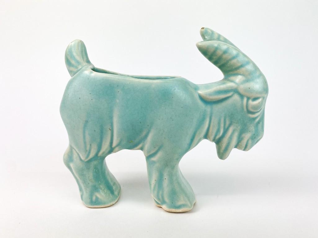 Vintage McCoy Pottery Stretch Goat Matte Aqua: Overall great condition. Some crazing and miniscule chip on tip of horn. Approx. dimensions: 4.5 in. H x 5.5 in. W x 1.5 in. D. H Weight: 9 oz.