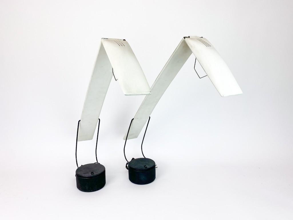 Pair Mario Barbaglia & Marco Colombo "Dove" Lamps: Pair Mario Barbaglia & Marco Colombo "Dove" Adjustable Desk Lamps for Paf Studio Italy. Cracks present on hinges. Approx. dimensions: 32 in. H x 33 in. W. Weight: 11.2 lbs.