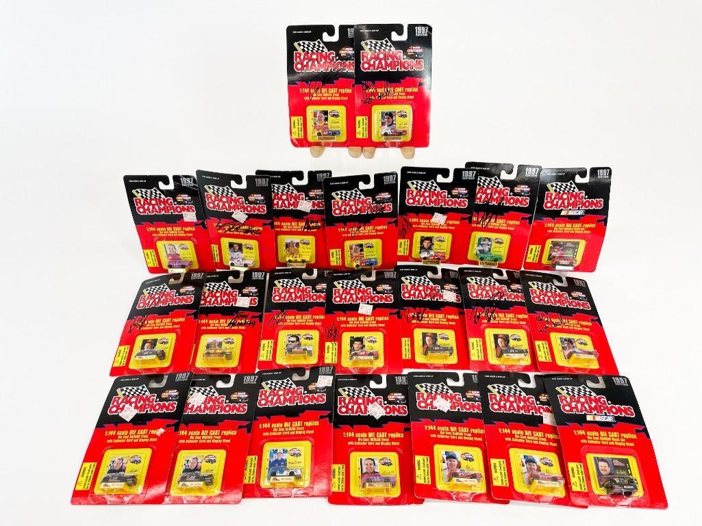 Lot of 23 Signed Racing Champions Mini Diecast Cars: Lot of 23 Signed Racing Champions Mini Diecast Cars Ron Barfield, Rick Cafelli, Tony Raines. Ron Barfield, Rick Cafelli, Tony Raines, Joe Ruttman. Overall good condition. Unopened blister packs. 14 ou