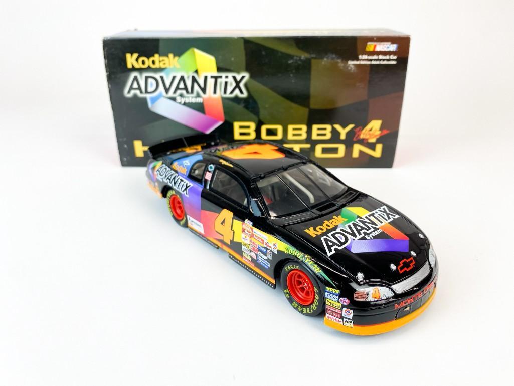 Bobby Hamilton #4 Kodak Advantix 1999 Monte Carlo: Bobby Hamilton #4 Kodak Advantix 1999 Monte Carlo NASCAR Model Car 1:24 Scale. Overall good condition. Includes original box. Very minor wear on box. Weight: 1.7 lbs.