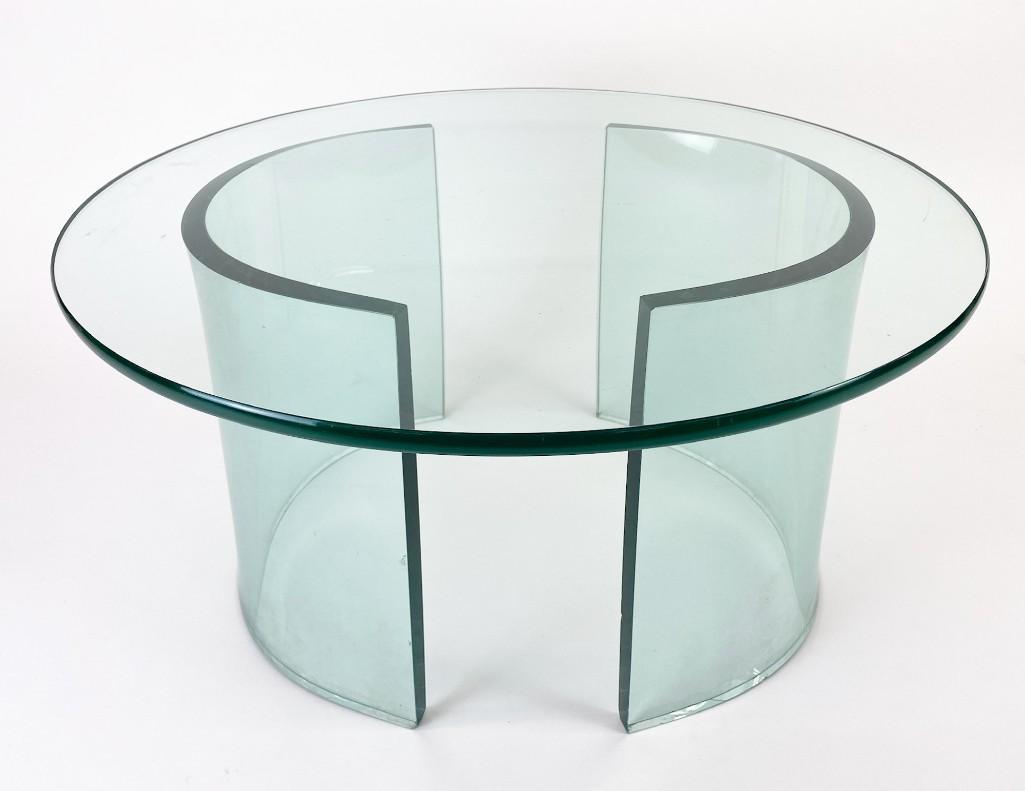 Modern Curved Glass Coffee Table: Modern Curved Glass Coffee Table Overall good condition. No major cracks/chips. Approx. dimensions: 15.5 in H x 28 in Diameter. Weight: 77.7 lbs