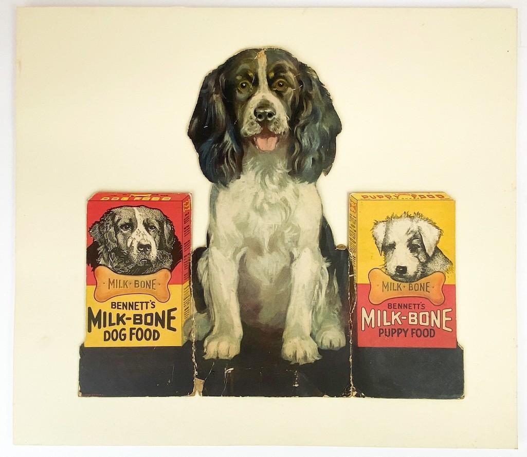 Vintage Milk-Bone Dog Food Cardboard Countertop Display: VIntage Milk-Bone Advertisement on Board. Wear commensurate with age. Mounted on board. Some creases and tears. Approx. dimensions: 17 in. H x 18 in. W. Weight: 1 lb.