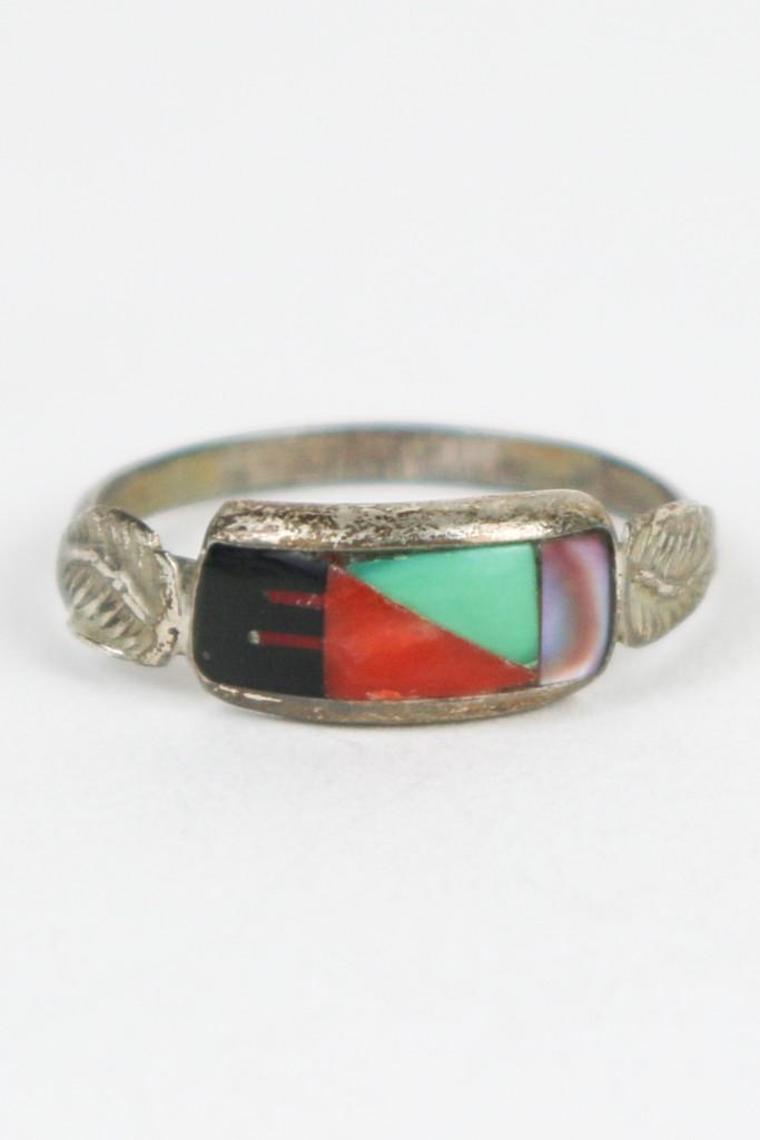 Multicolored Native American Handmade Silver Inlay Ring: Multicolored Native American Handmade Silver Inlay Ring. Ring band is approx. .25 in. wide. Ring size 8.5. Weight 1.8 grams.