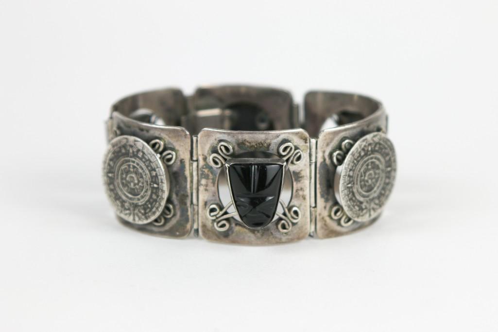 Jose Anton Mexico Sterling Silver Bracelet w/Aztec Motif: Jose Anton Mexico Sterling Silver Bracelet w/Aztec Motif. Approx 6.5 in long x 1 in wide. Marked ANTON STERLING. weight 59.2 grams