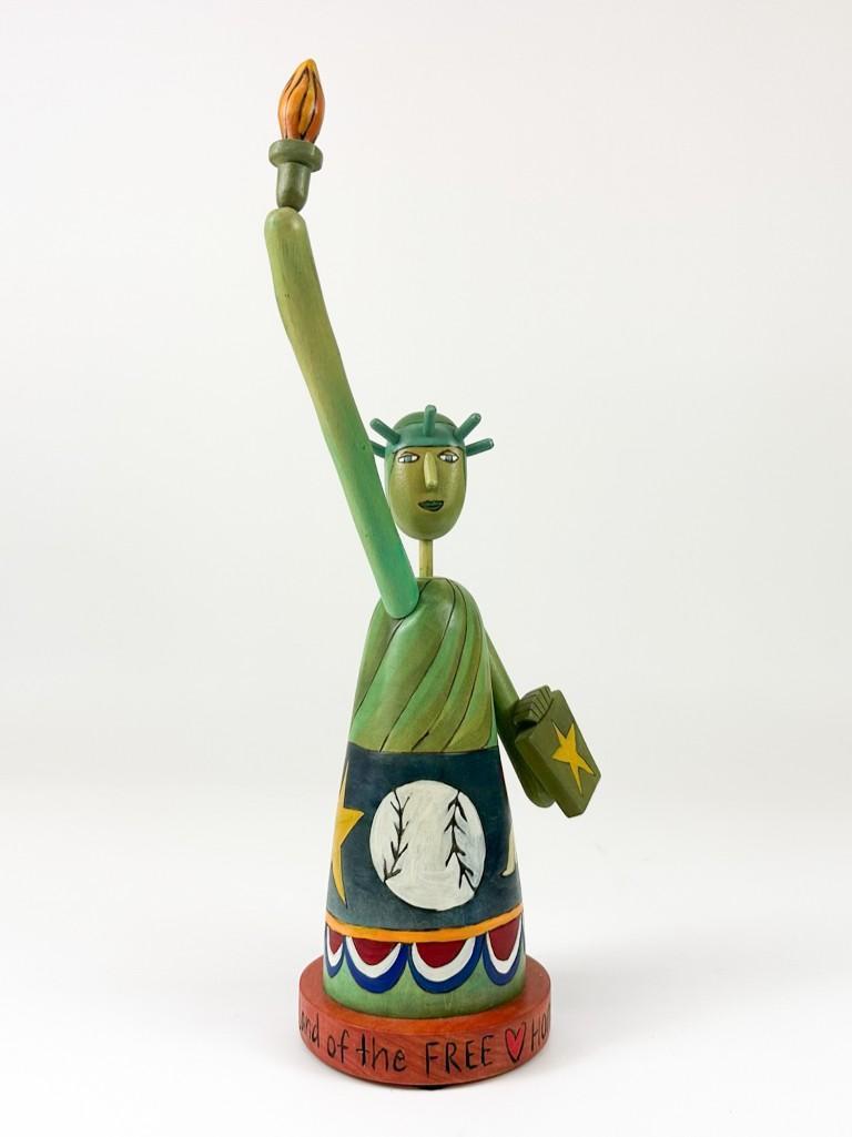 Sticks Statue of Liberty Folk Art Stamped USA 005: Sticks Statue of Liberty Folk Art Stamped USA 005. Good condition. Arms are removable. To tip of flame approx. 19.2 x 9 x 5.5 in. Weight 2.2 lbs.