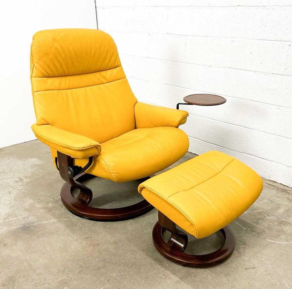 Ekornes Stressless Chair and Ottoman w/Left Sided Swing Table: Ekornes Stressless Chair and Ottoman w/Left Sided Swing Table. Table swings over seat. Chair reclines. Chair: (back upright) Approx. 40 in. H x 34 in. W x 30 in. D. Weight 40 lbs. Ottoman: Approx. 16 