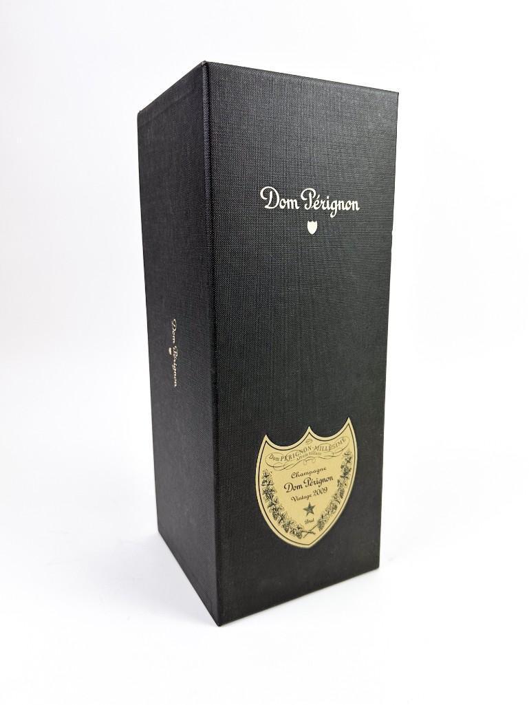 2009 Dom Perignon Champagne w/ Box: (2) Dom Perignon Champagne, Vintage 2009, 750 ml. Provenance: From a Los Angeles, California estate. Note: Wine stored in a climate controlled wine cellar.