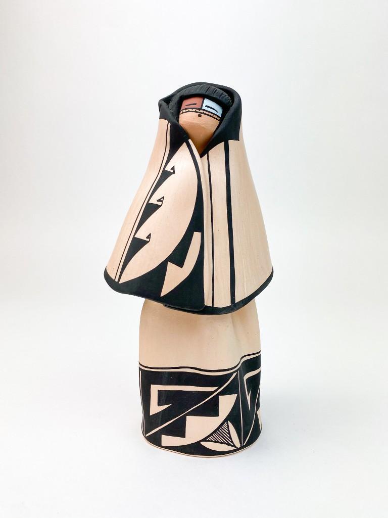Angelina Medina (b.1942) Acoma Clay Hooded Figure: Overall excellent condition. Approx. dimensions: 8.5 in. H x 4 in. W x 3.5 in. D. Weight: 1 lb 5 oz.