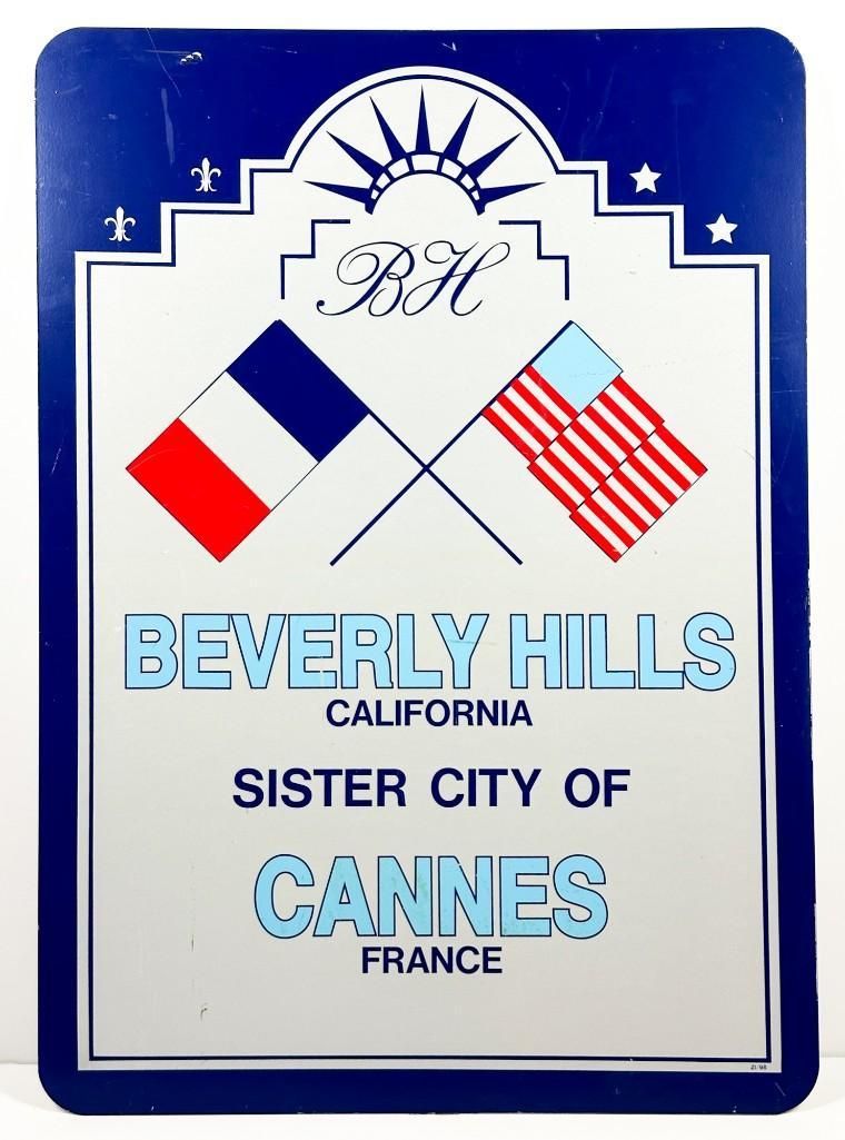 Beverly Hills Sign Movie Prop: Beverly Hills city sign prop from the film Anywhere But Here. Labeled 20th Century Props. Vinyl print on sheet aluminum. Approx. 42 iin. Hx 30 in. W x .094 in. D. Weight 10 lbs.