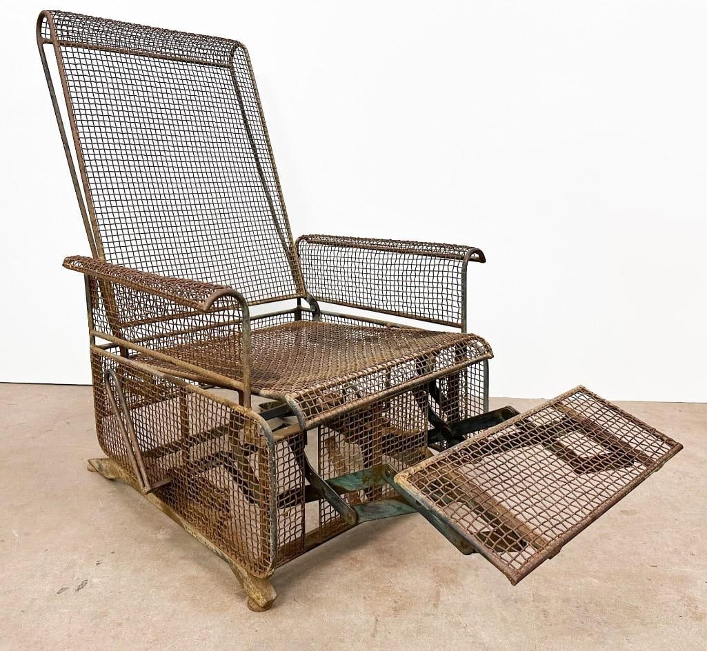 Mid Century Iron Rocking Recliner Chair: Mid Century Iron Rocking Recliner Chair. Raw steel with light rust patina. Approx. 40.5 in. H x 28.75 in. x 36 in. D.