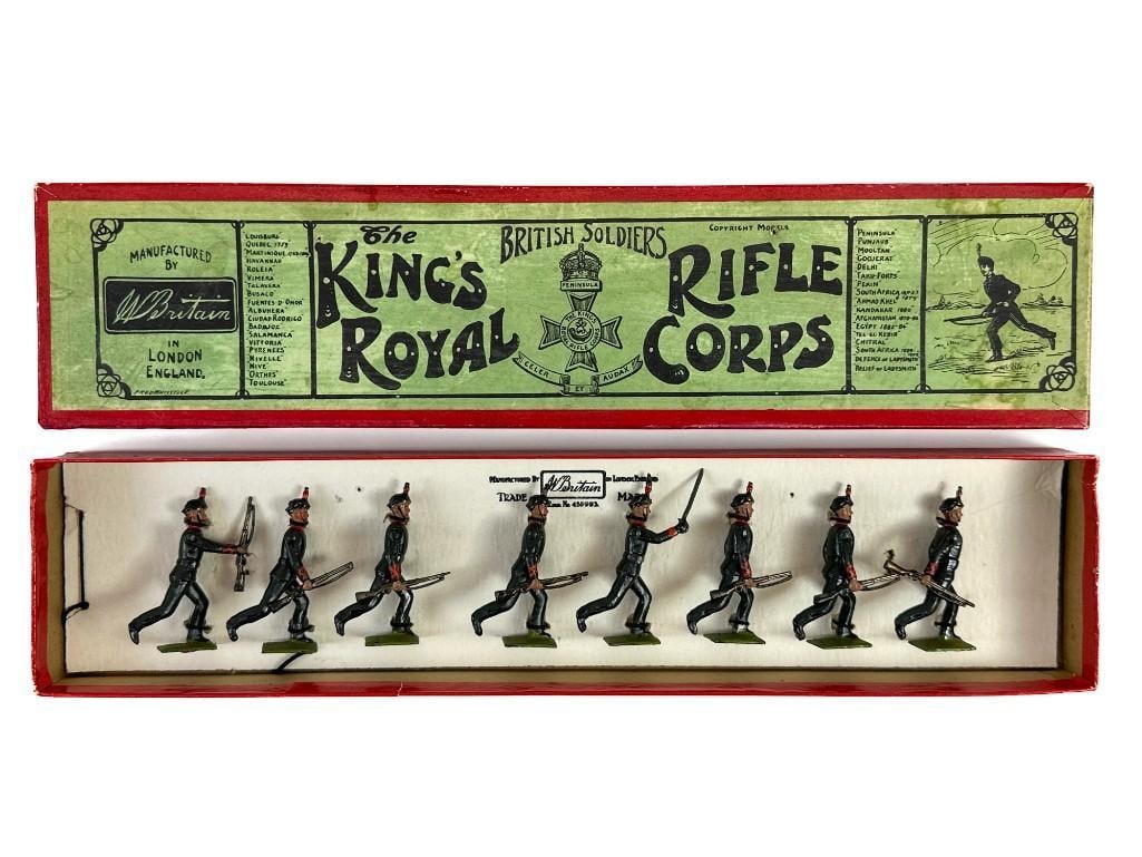 Britains Set Kings Royal Rifle Corps #98: Britains Set Kings Royal Rifle Corps #98. Full set with 8 figures tied into original box. Figures are in good condition with 2 rifles missing muzzle ends and crackle to green paint on bases. Box is in