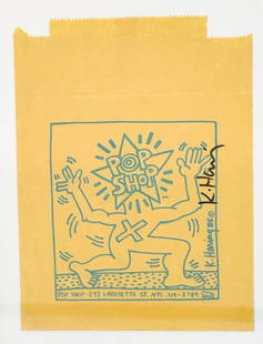 Keith Haring (1958-1990) Signed Pop Shop Paper Bag: Keith Haring (1958-1990) Signed Pop Shop Paper Bag. Includes plexiglass frame. Frame has 2 chips in either corner. Approx: frame: 17 in H x 13.5 in W; visible: 11.5 in H x 8.5 in W. Weight: 2.4 lbs.