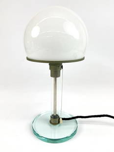 Wilhelm Wagenfeld Bauhaus Table Lamp Model WG 24: Wilhelm Wagenfeld Bauhaus Table Lamp Model WG 24. German made. White and clear glass with nickel-plated metal. Approx. 14.5 x 6 x 6 inches. Good condition. Glass pieces are in great shape. No visible