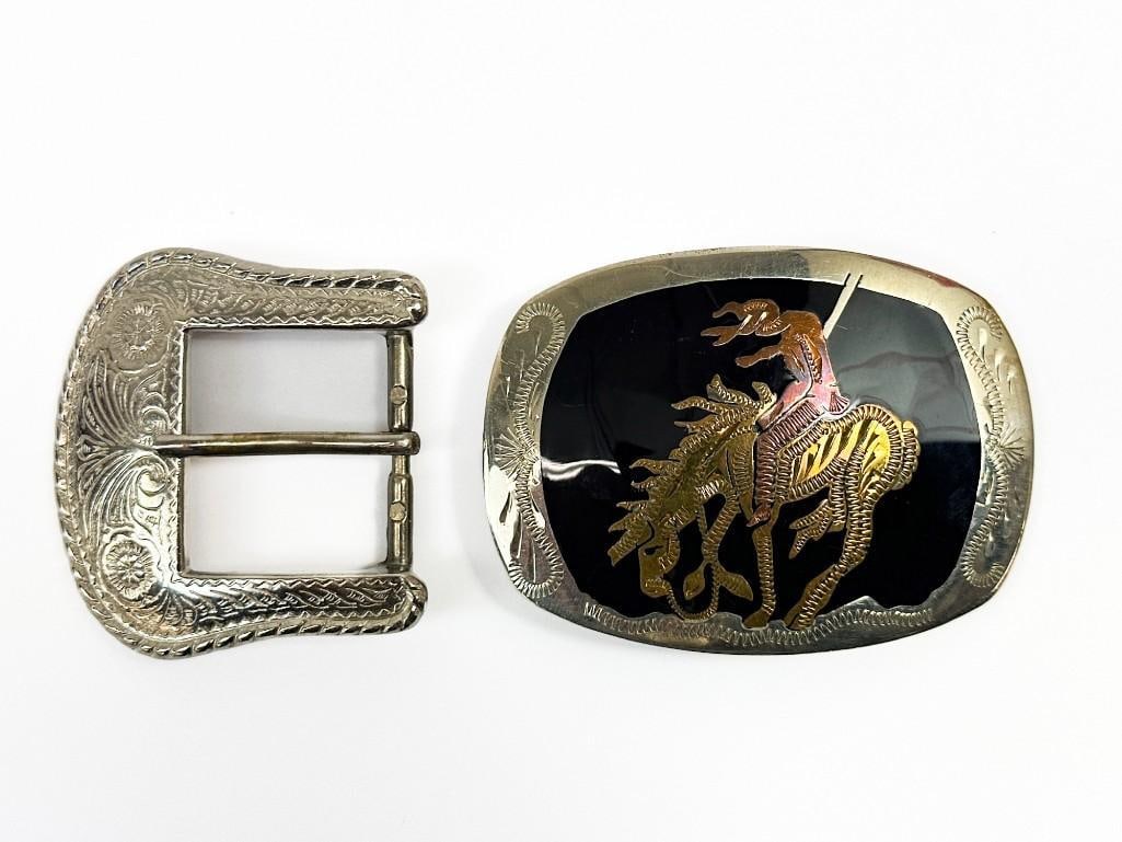 Nick Chavez Collection: Belt Buckle, Ranger Buckle with Indian on Horse: Nick Chavez Collection: Belt Buckle, Ranger Buckle with Indian on Horse. Western buckle approx. 2.5 in. H x 2.5 in. W x .5 in. D. Indian on horse buckle approx. 2.5 in. H x 3.5 in. H x .5 in. D From C
