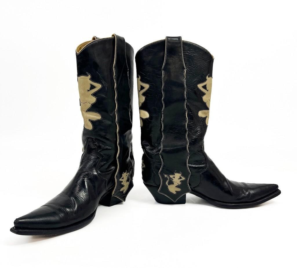 Nick Chavez Collection: Vintage Liberty Cowboy Boots Devil Girl Size 10 1/2 Mens: Nick Chavez Collection: Vintage Liberty Cowboy Boots Devil Girl Size 10 1/2 Mens. Size 10 1/2 D. In good condition with light surface wear. Light wear to soles. Approx. 14.5 in. H x 12.5 in. W x 4.25 