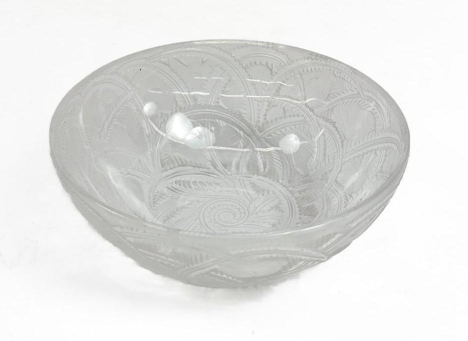 Large Lalique Bowl w/ No Sticker: Features beautiful bird design. Great condition overall. No chips or cracks. Lalique etching on bottom. Rings like a bell. Approx: 3.5 in H x 9.25 in dia. Weight: 3.4 lbs.