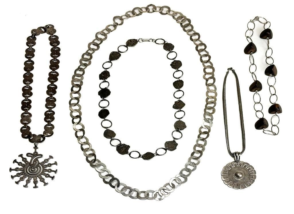 Lot of 5 Mid Century Silver Necklaces: Lot of 5 Mid Century Silver Necklaces. Various makers. Some stamped 925. Some unmarked. Good condition overall. Various sizes.