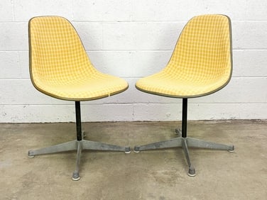 Pair of Eames Side Chairs Orange Yellow Plaid Fabric On Orange Fiberglass on Swivel Bases