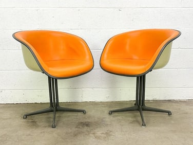 Pair Eames Arm Chairs Orange La Fonda Naugahyde on Parchment Fiberglass on La Fonda Base